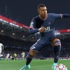 Kylian Mbappe dribbling the ball in the Parc de Princes.