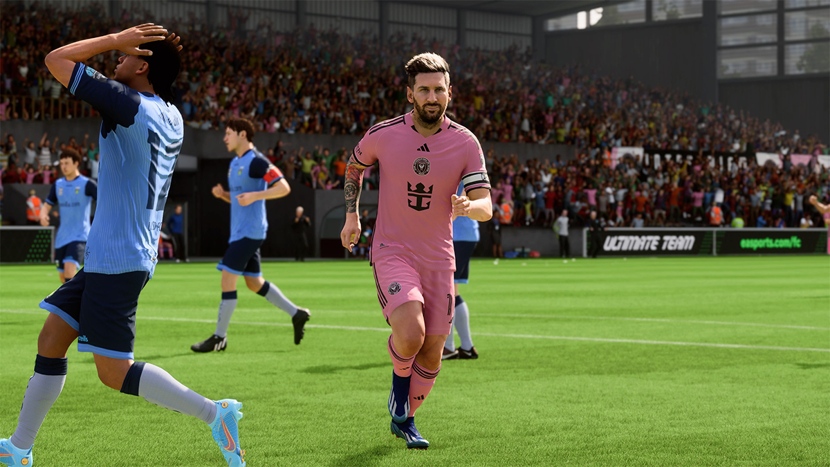 Lionel Messi in a pink Inter Miami kit running away after scoring.