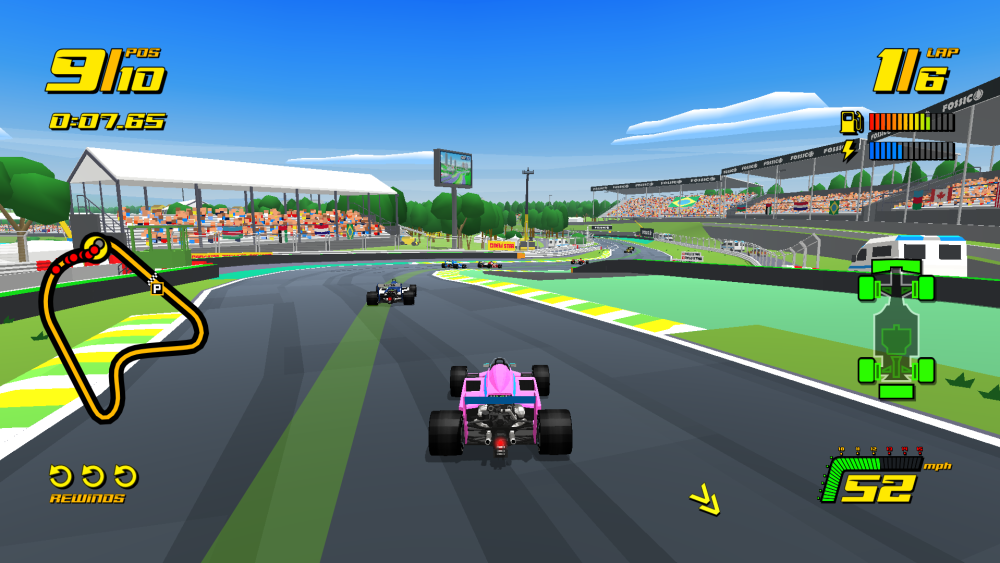 A pink and blue car driving down the Senna S at Interlagos in New Star GP. 